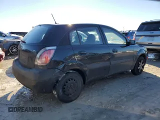 2009 Kia Rio LX with VIN KNADE243796516902, listed as a Copart auction lot 86567394 with 304,684 mi miles and Salvage Title. Bid and sale history available at carsss.com. Image 3.