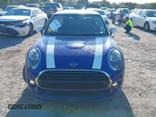 2019 MINI Hardtop Cooper with VIN WMWXP5C52K2H97728, listed as a IAAI auction lot 42026666 with 61,464 mi miles and . Bid and sale history available at DreamBid. Image 12.