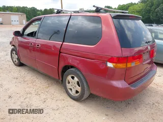 2002 Honda Odyssey EX with VIN 5FNRL18612B028570, listed as a IAAI auction lot 42491201 with 203,401 mi miles and . Bid and sale history available at DreamBid. Image 3.