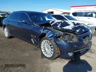 2012 BMW 7 Series 750Li xDrive with VIN WBAKC8C52CC436399, listed as a IAAI auction lot 41214440 with 122,532 mi miles. Bid and sale history available at carsss.com. Image 1.