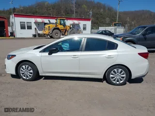 2018 Subaru Impreza with VIN 4S3GKAA6XJ3613244, listed as a IAAI auction lot 42036955 with 77,272 mi miles. Bid and sale history available at carsss.com. Image 14.