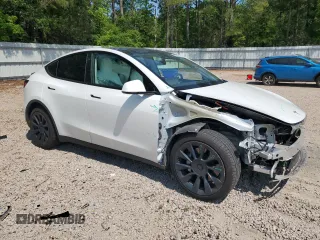 2022 Tesla Model Y Long Range z VIN 7SAYGDEE1NF354633, wystawiony jako Copart lot #55221835 z przebiegiem 53 821 mil mil oraz Szkoda całkowita • Salvage title. Historia ofert i sprzedaży dostępna na DreamBid. Obrazek 4.
