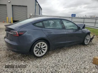 2022 Tesla Model 3 with VIN 5YJ3E1EA4NF371483, listed as a Copart auction lot 49287665 with 59,476 mi miles and Salvage Title. Bid and sale history available at DreamBid. Image 3.