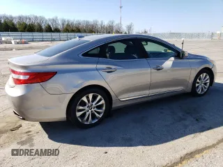 2013 Hyundai Azera с VIN KMHFG4JG8DA256908, выставлен на аукционе Copart как лот 50573915 с пробегом 146 015 миль миль и Списание • Salvage title. История ставок и продаж доступна на DreamBid. Изображение 3.