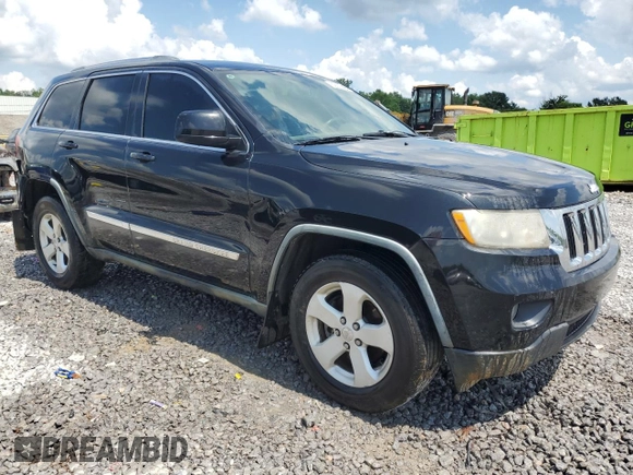2011 Jeep Grand Cherokee Laredo with VIN 1J4RR4GG6BC538074, listed as a Copart auction lot 60231465 with 203,942 mi miles and Salvage title. Bid and sale history available at DreamBid. Image 4.