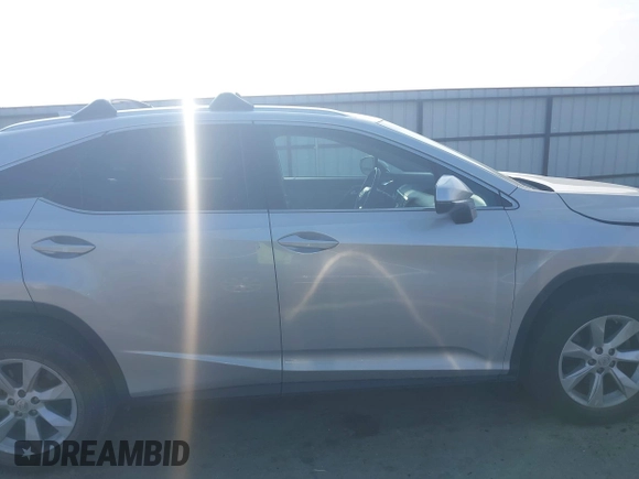 2016 Lexus RX 350 z VIN 2T2ZZMCA3GC005603, wystawiony jako IAAI lot #42492879 z przebiegiem 122 778 mil mil oraz . Historia ofert i sprzedaży dostępna na DreamBid. Obrazek 13.
