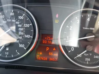 2010 BMW 3 Series 328i with VIN WBAWV1C51AP123689, listed as a IAAI auction lot 41966621 with 187,428 mi miles. Bid and sale history available at carsss.com. Image 7.