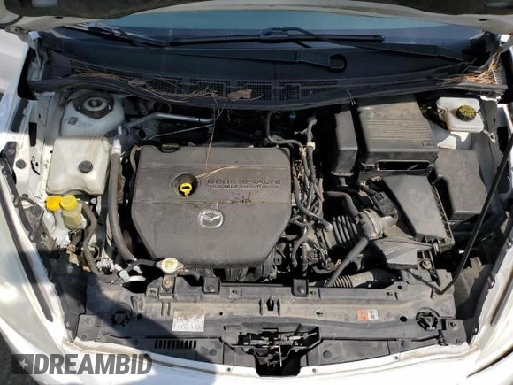 2012 Mazda 5 Sport with VIN JM1CW2BL0C0134154, listed as a Copart auction lot 65364604 with 107,241 mi miles and Salvage Title. Bid and sale history available at DreamBid. Image 12.