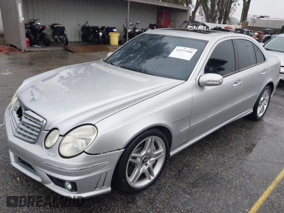 2003 Mercedes-Benz E-Class 5.5L AMG with VIN WDBUF76J93A351317, listed as a IAAI auction lot 41573446 with 144,119 mi miles. Bid and sale history available at carsss.com. Image 17.