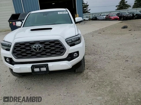 2023 Toyota Tacoma SR z VIN 3TMCZ5AN0PM651386, wystawiony jako Copart lot #51158185 z przebiegiem 23 642 mil mil oraz Szkoda całkowita • Salvage title. Historia ofert i sprzedaży dostępna na DreamBid. Obrazek 11.