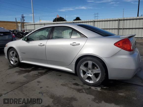 2009 Pontiac G6 with VIN 1G2ZL577094232011, listed as a Copart auction lot 77175054 with 133,353 mi miles and Salvage title. Bid and sale history available at DreamBid. Image 2.