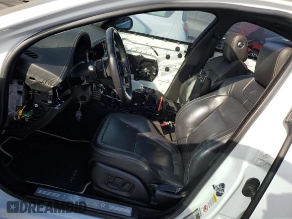 2013 Jaguar XF with VIN SAJWA8JC7DMS77243, listed as a Copart auction lot 77583544 with Not Provided miles and Salvage Title. Bid and sale history available at DreamBid. Image 7.