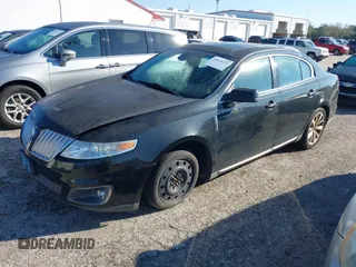 2009 Lincoln MKS with VIN 1LNHM94RX9G607947, listed as a IAAI auction lot 41644221 with 184,979 mi miles. Bid and sale history available at carsss.com. Image 2.