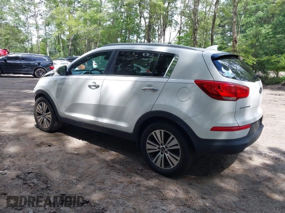 2014 Kia Sportage EX with VIN KNDPCCAC5E7658993, listed as a IAAI auction lot 42679549 with 107,658 mi miles and . Bid and sale history available at DreamBid. Image 3.