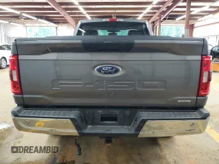 2021 Ford F-150 XL with VIN 1FTMF1EP7MKE58611, listed as a Copart auction lot 56912955 with 30,850 mi miles and Salvage title. Bid and sale history available at DreamBid. Image 6.