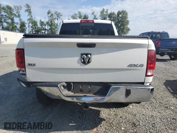 2014 Ram 1500 SLT z VIN 1C6RR7GT1ES186284, wystawiony jako Copart lot #58061785 z przebiegiem 135 890 mil mil oraz Szkoda całkowita • Salvage title. Historia ofert i sprzedaży dostępna na DreamBid. Obrazek 6.