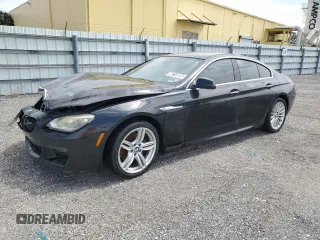 2013 BMW 6 Series 650i with VIN WBA6B2C55DD128558, listed as a Copart auction lot 48715085 with 85,718 mi miles and Clean Title. Bid and sale history available at carsss.com. Image 1.