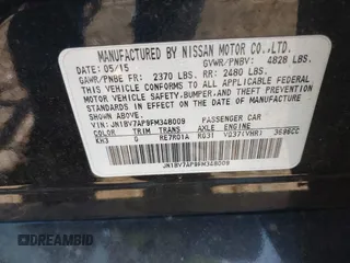 2015 Infiniti Q50 Premium with VIN JN1BV7AP9FM348009, listed as a IAAI auction lot 41852281 with 124,118 mi miles. Bid and sale history available at carsss.com. Image 9.
