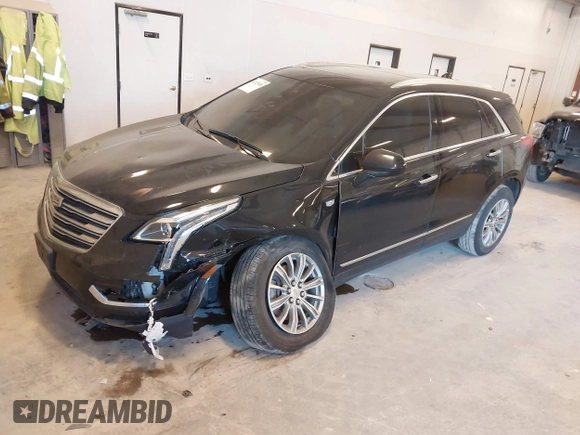 2017 Cadillac XT5 Luxury FWD with VIN 1GYKNBRS6HZ177941, listed as a IAAI auction lot 42123488 with 183,990 mi miles and . Bid and sale history available at DreamBid. Image 2.