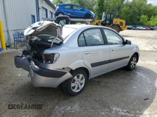 2009 Kia Rio LX with VIN KNADE223396548989, listed as a Copart auction lot 64964304 with 150,426 mi miles and Salvage Title. Bid and sale history available at carsss.com. Image 3.