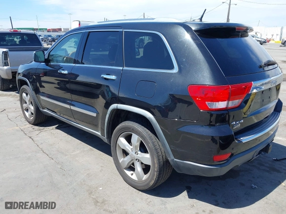 2012 Jeep Grand Cherokee Overland with VIN 1C4RJFCT7CC185602, listed as a IAAI auction lot 42018715 with 91,507 mi miles. Bid and sale history available at carsss.com. Image 3.