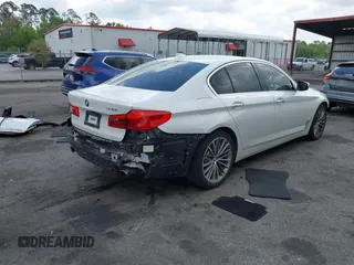2018 BMW 5 Series 530i with VIN WBAJA5C55JWA38747, listed as a IAAI auction lot 41922937 with 100,951 mi miles and . Bid and sale history available at DreamBid. Image 4.