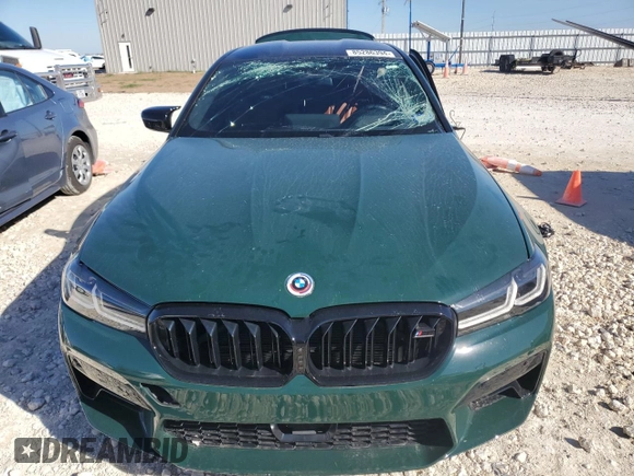 2023 BMW M5 with VIN WBS83CH02PCM33496, listed as a Copart auction lot 85286394 with 0 mi miles and Salvage Title. Bid and sale history available at carsss.com. Image 5.
