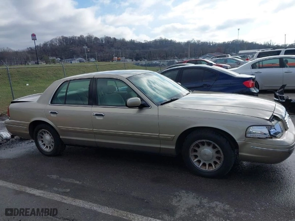 1999 Ford Crown Victoria LX with VIN 2FAFP74W0XX179512, listed as a IAAI auction lot 41124866 with 101,282 mi miles. Bid and sale history available at carsss.com. Image 13.