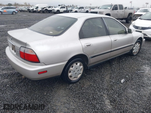 1997 Honda Accord LX with VIN 1HGCD5636VA237594, listed as a IAAI auction lot 41802597 with 215,782 mi miles and . Bid and sale history available at carsss.com. Image 4.