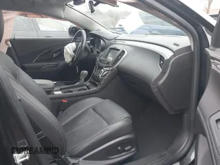 2014 Buick LaCrosse Premium II with VIN 1G4GF5G39EF305104, listed as a IAAI auction lot 41715121 with 81,341 mi miles and . Bid and sale history available at DreamBid. Image 5.