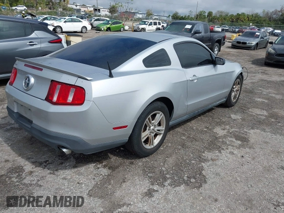 2012 Ford Mustang Premium with VIN 1ZVBP8AMXC5277683, listed as a IAAI auction lot 41674173 with 219,243 mi miles and . Bid and sale history available at carsss.com. Image 4.