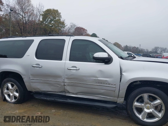 2014 Chevrolet Suburban LTZ with VIN 1GNSCKE05ER173446, listed as a IAAI auction lot 41047096 with 189,049 mi miles and . Bid and sale history available at DreamBid. Image 6.