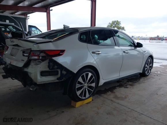 2017 Kia Optima SX with VIN 5XXGW4L2XHG136843, listed as a IAAI auction lot 41806606 with 157,899 mi miles. Bid and sale history available at carsss.com. Image 4.