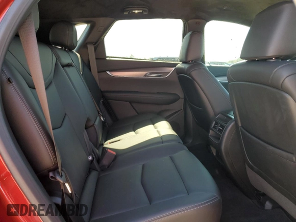 2023 Cadillac XT5 FWD Luxury z VIN 1GYKNAR45PZ191436, wystawiony jako Copart lot #45653615 z przebiegiem 15 044 mil mil oraz Szkoda całkowita • Salvage title. Historia ofert i sprzedaży dostępna na DreamBid. Obrazek 11.