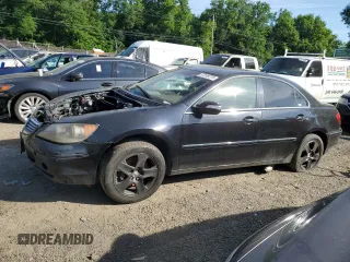 2005 Acura RL z VIN JH4KB16525C012733, wystawiony jako Copart lot #57248275 z przebiegiem Nie podano mil oraz Szkoda całkowita • Salvage title. Historia ofert i sprzedaży dostępna na DreamBid. Obrazek 1.