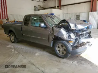 2002 Ford F-150 XL with VIN 1FTRX17212NB63939, listed as a Copart auction lot 62728225 with Not provided miles and Salvage title. Bid and sale history available at DreamBid. Image 4.