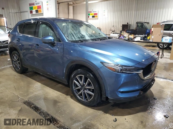 2018 Mazda CX-5 Grand Touring with VIN JM3KFBDM9J0411504, listed as a Copart auction lot 42050825 with 125,695 mi miles and Salvage Title. Bid and sale history available at carsss.com. Image 4.