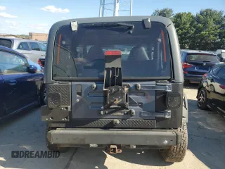 2002 Jeep Wrangler Sport with VIN 1J4FA49S72P715946, listed as a Copart auction lot 70884114 with 114,964 mi miles and Clean Title. Bid and sale history available at carsss.com. Image 6.