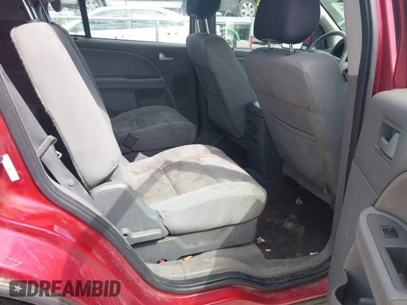2007 Ford Freestyle SEL z VIN 1FMDK02127GA35640, wystawiony jako IAAI lot #42757024 z przebiegiem 345 687 mil mil oraz . Historia ofert i sprzedaży dostępna na DreamBid. Obrazek 8.
