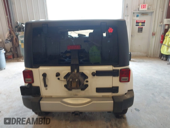 2015 Jeep Wrangler Sahara with VIN 1C4AJWBG7FL648621, listed as a IAAI auction lot 42439781 with 107,148 mi miles and . Bid and sale history available at DreamBid. Image 16.