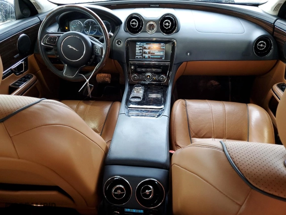 2015 Jaguar XJ with VIN SAJWJ2GD2F8V90287, listed as a Copart auction lot 50291095 with 46,917 mi miles and Salvage Title. Bid and sale history available at carsss.com. Image 8.