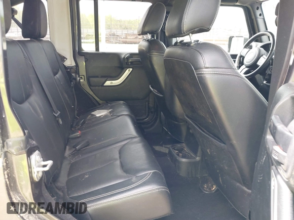 2017 Jeep Wrangler Unlimited Sahara with VIN 1C4BJWEGXHL595724, listed as a IAAI auction lot 42018264 with 95,948 mi miles. Bid and sale history available at carsss.com. Image 8.