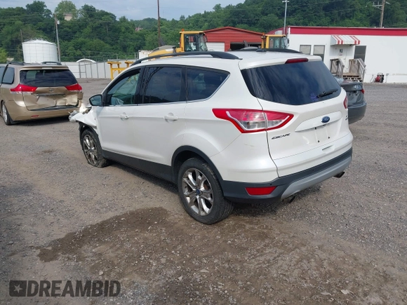 2014 Ford Escape SE with VIN 1FMCU9G99EUA09575, listed as a IAAI auction lot 42615476 with 107,948 mi miles and . Bid and sale history available at DreamBid. Image 3.