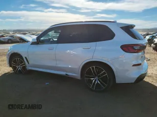 2020 BMW X5 M50i with VIN 5UXJU4C00L9B77869, listed as a Copart auction lot 36123043 with 27,195 mi miles. Bid and sale history available at carsss.com. Image 2.