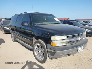 2001 Chevrolet Suburban LS z VIN 3GNEC16T81G216977, wystawiony jako IAAI lot #42538021 z przebiegiem 404 293 mil mil oraz . Historia ofert i sprzedaży dostępna na DreamBid. Obrazek 1.