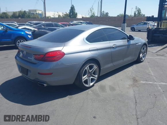 2013 BMW 6 Series 650i with VIN WBAYM9C53DDW20145, listed as a IAAI auction lot 42039618 with 66,684 mi miles and . Bid and sale history available at carsss.com. Image 4.
