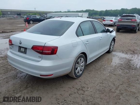 2017 Volkswagen Jetta S with VIN 3VW2B7AJ8HM328548, listed as a IAAI auction lot 42434695 with 123,236 mi miles and . Bid and sale history available at DreamBid. Image 4.