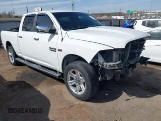2018 Ram 1500 Big Horn z VIN 1C6RR7TT7JS194115, wystawiony jako IAAI lot #41792077 z przebiegiem 170 600 mil mil oraz . Historia ofert i sprzedaży dostępna na DreamBid. Obrazek 1.