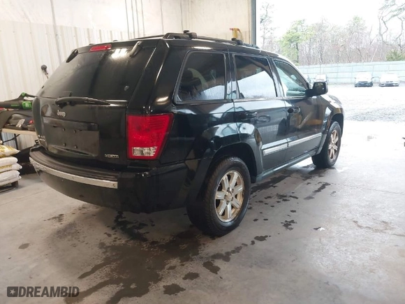 2008 Jeep Grand Cherokee Limited with VIN 1J8HR58228C117383, listed as a IAAI auction lot 41983207 with 168,018 mi miles. Bid and sale history available at carsss.com. Image 4.