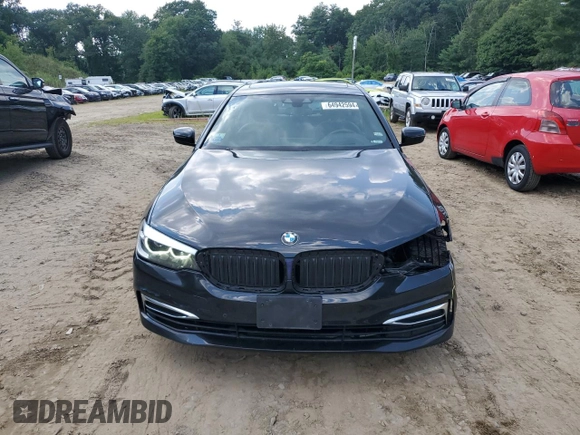 2020 BMW 5 Series with VIN WBAJB1C03LCD19170, listed as a Copart auction lot 64942594 with 66,584 mi miles and Salvage title. Bid and sale history available at DreamBid. Image 5.